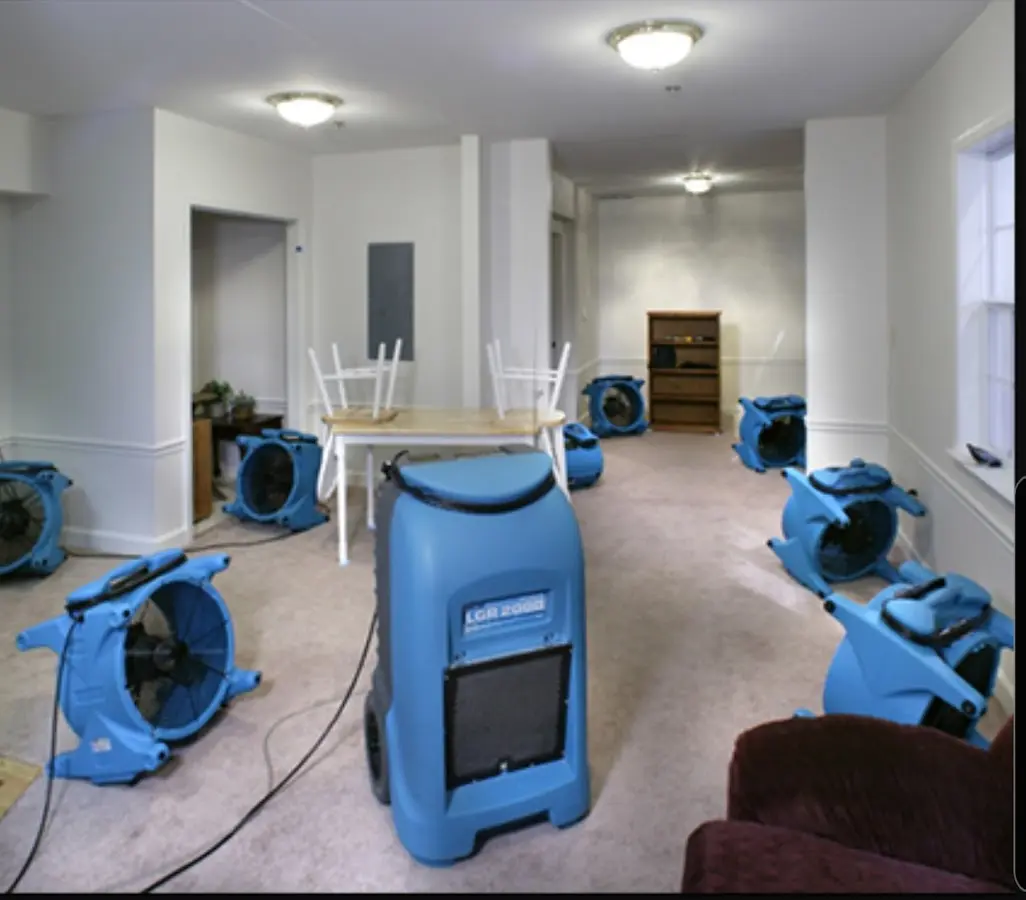 Air movers and dehumidifier setup for Water Damage Restoration in Minden